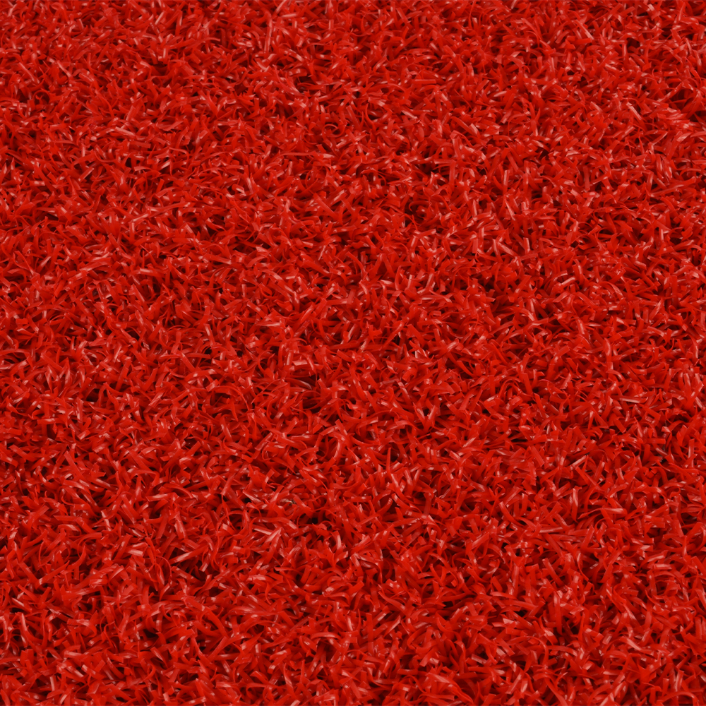 close up of red colored baseball home plate mat