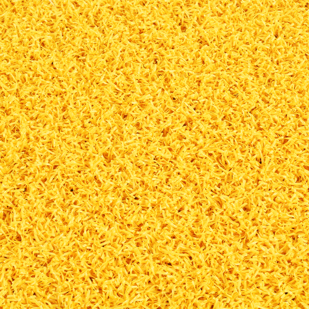 close up of yellow colored baseball home plate mat