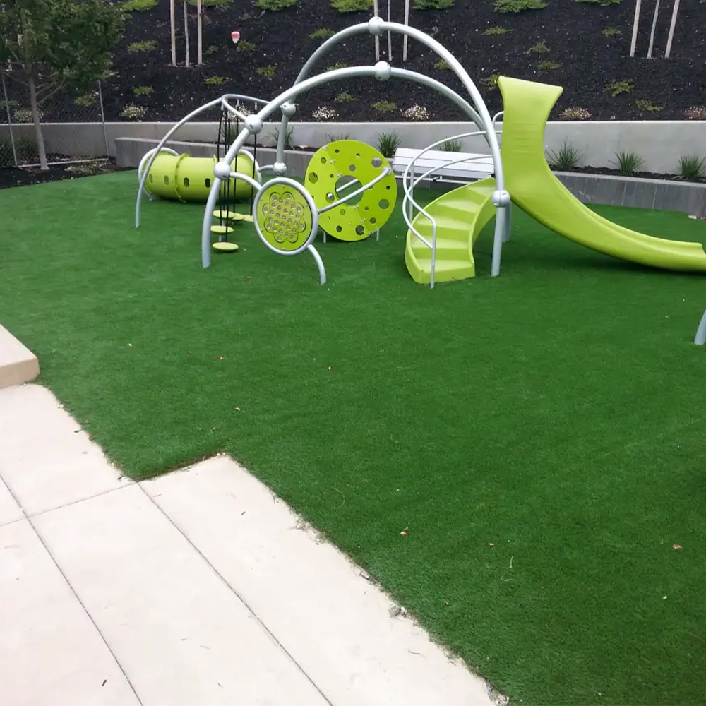 playground turf underneath jungle gym equipment