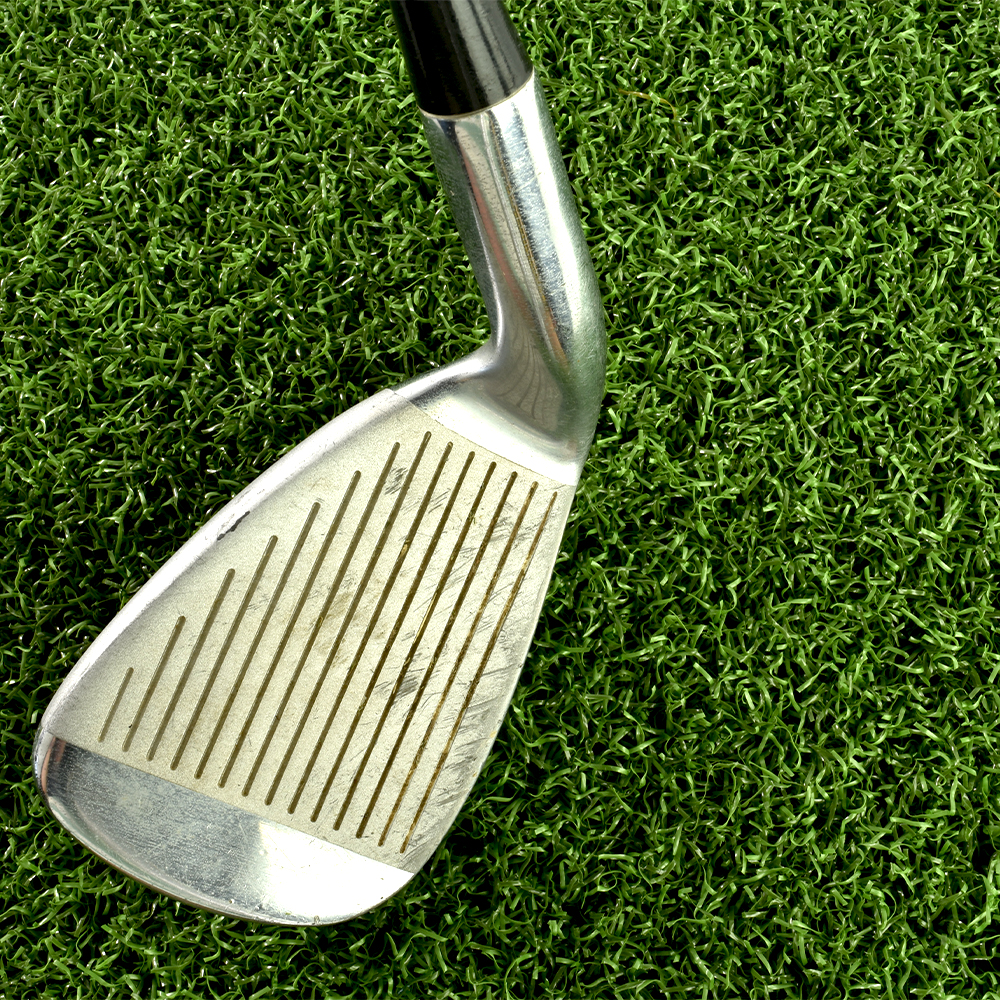 Troon Artificial Turf Roll with 7 iron golf club close up