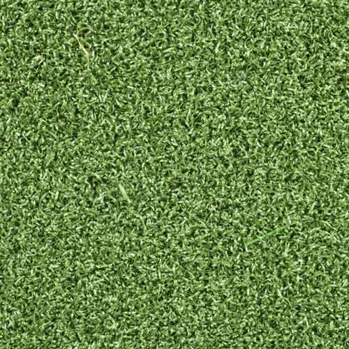 fake grass over dirt closeup