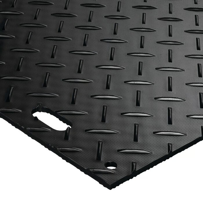 MambaMat Ground Protection Mat Black 1/2 Inch x 3x6 Ft. close up with hand holes. 