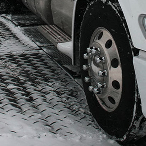 Ground Protection Mats 4x8 ft Black with truck in snow