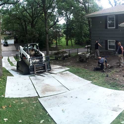 Landscaping Mats under Bobcat with Tracks