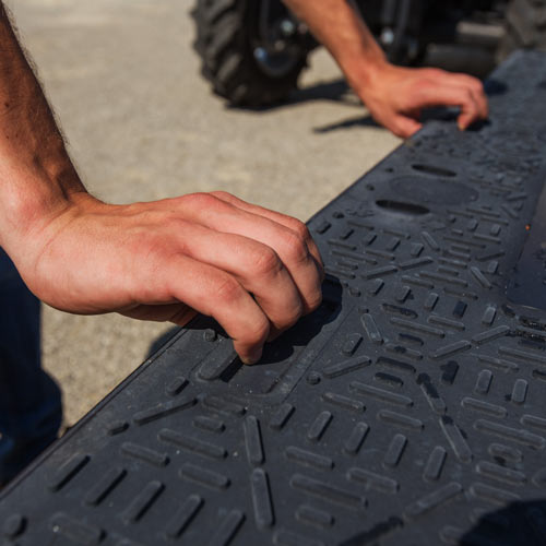over asphalt ground protection mats