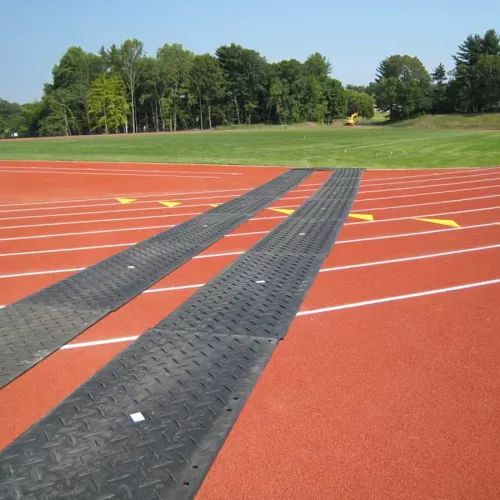 access mats used over a school running track