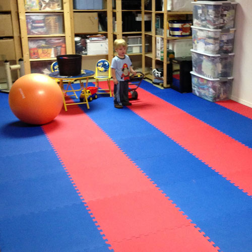 Home Exercise Foam Floor showing floor in use kids floor.