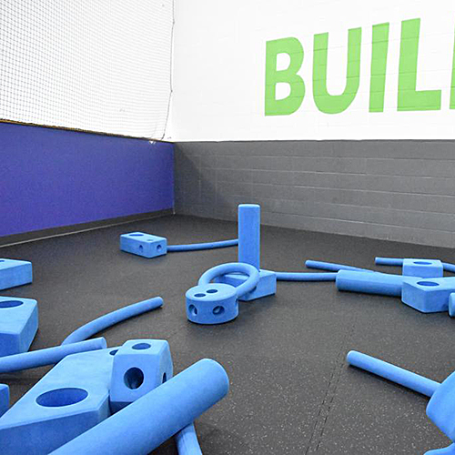 geneva interlocking rubber tiles with color flecks in kids building room