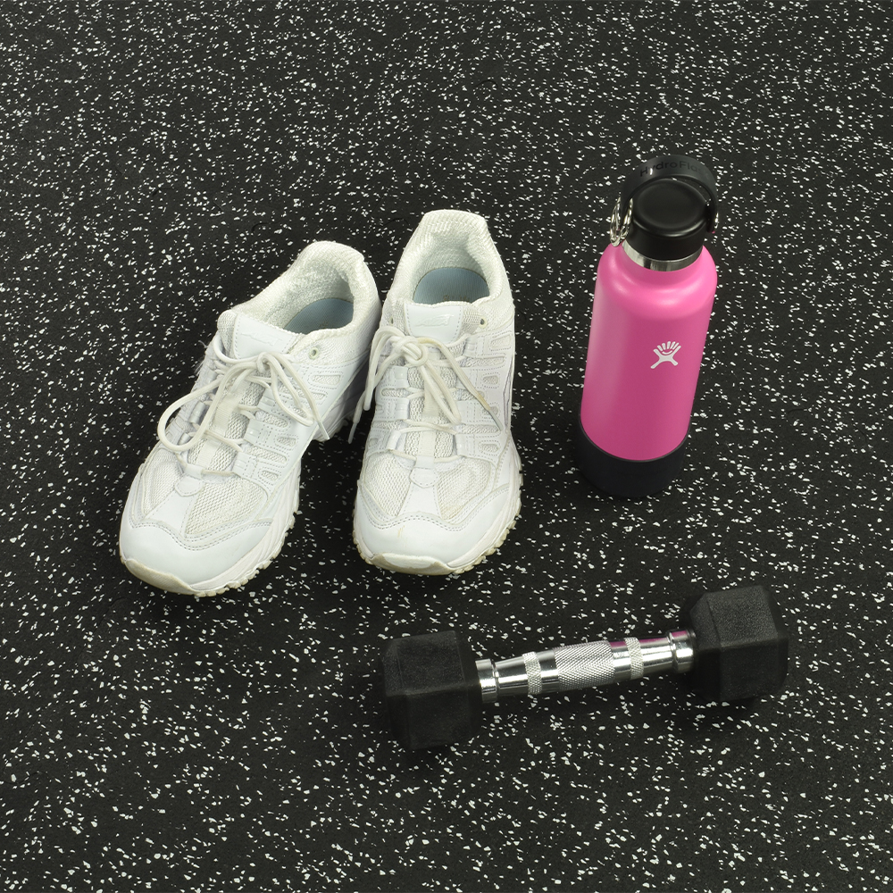 Interlocking Rubber Floor Tiles Gmats with light gray flecks with tennis shoes, water bottle and dumbbell