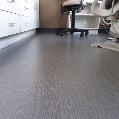 gray commercial wood grain look flooring