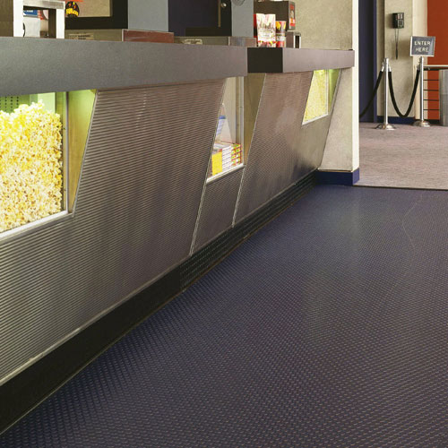 coin top pattern flooring in a movie theater