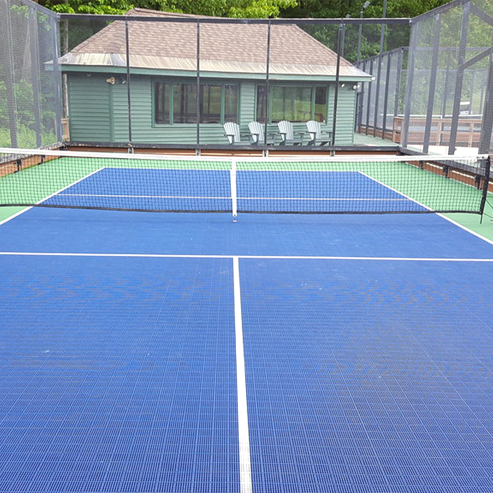 Pickleball Court Kit with Lines 30x60 Ft. with club house, net and fence in sport green and navy blue.