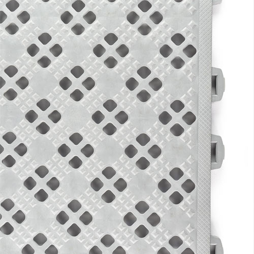 perforated gray floor tiles