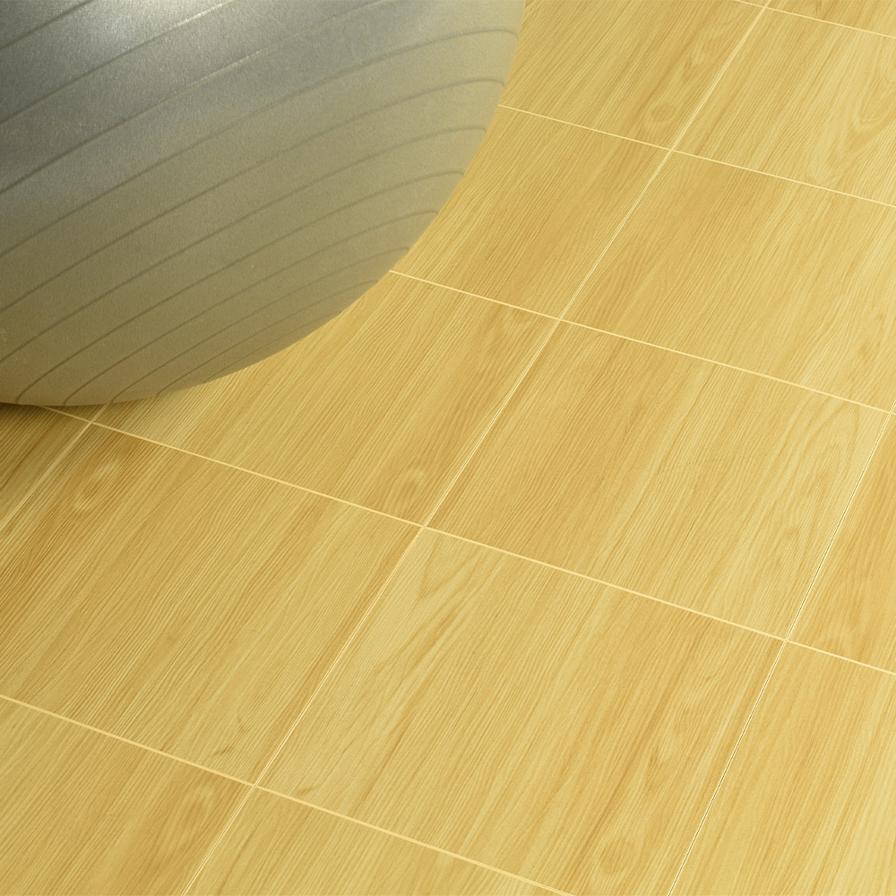 Golden Maple EZ Portable Dance Floor Tile with an exercise ball