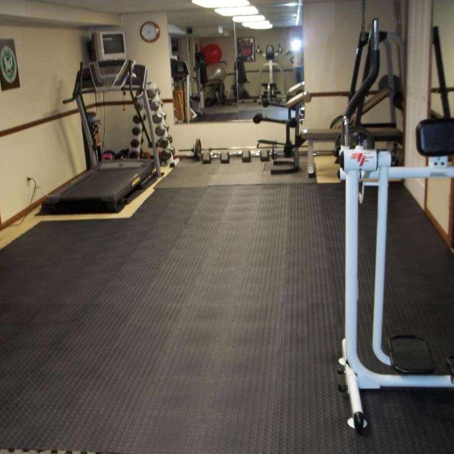 StayLock Bump Top Floor tiles Black workout room.