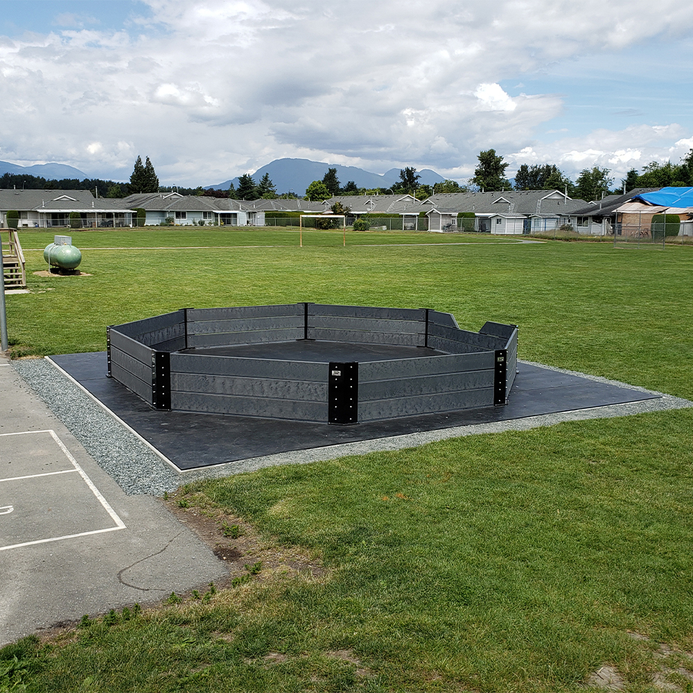 Gaga Ball Pit Rubber Floor Kit 27.9 x 29.7 Ft. installed at playground.