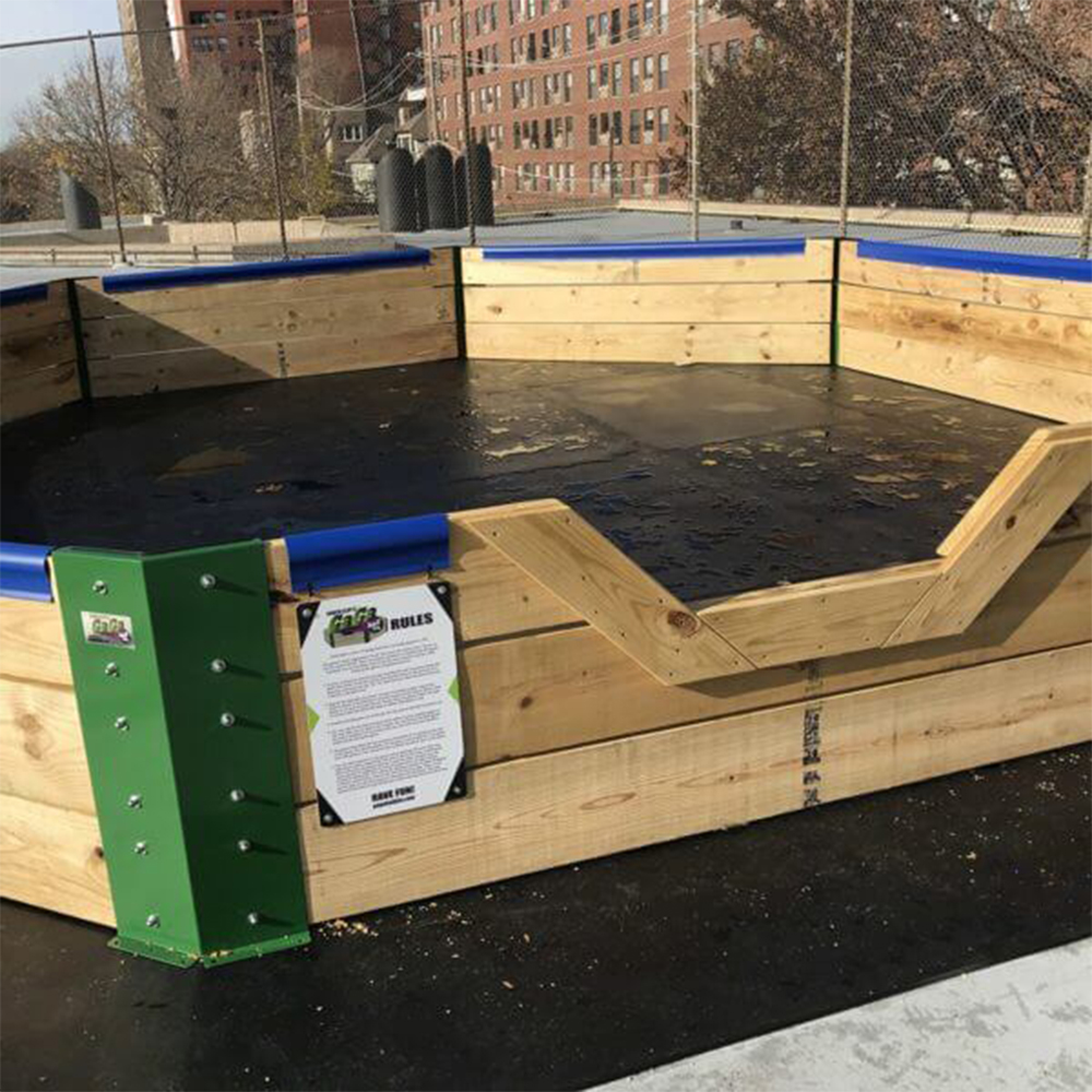 outdoor wood gaga ball pit with rubber flooring