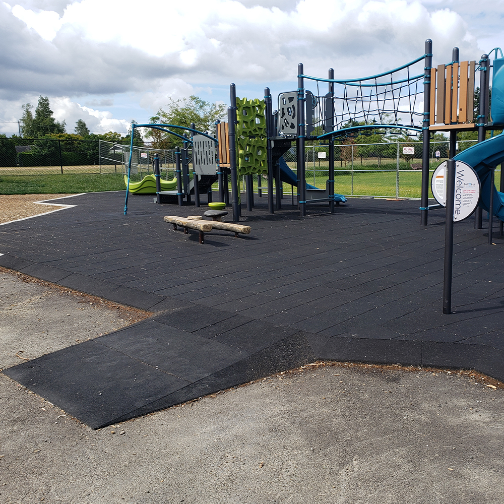 Slide and bridge with StrongPlay Playground Edge Ramp 1.75 Inch x 10x40 Inches black tile with ADA ramp 