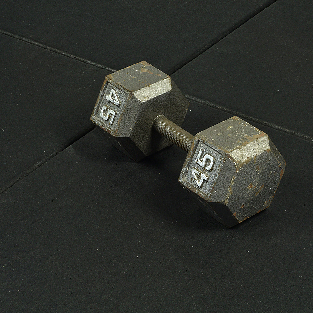 https://www.greatmats.com/images/one-inch-rubber-mats/ultratile-black-gym-floor-w-dumbbell.jpg