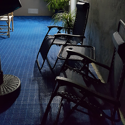 blue patio outdoor tiles with blue chairs