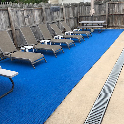 Blue outdoor tiles for pool deck over concrete