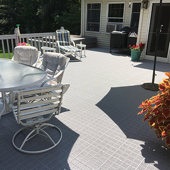 deck tiles under for under a grill