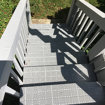 deck stairs with patio perforated tiles