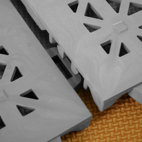 perforated interlocking deck tiles