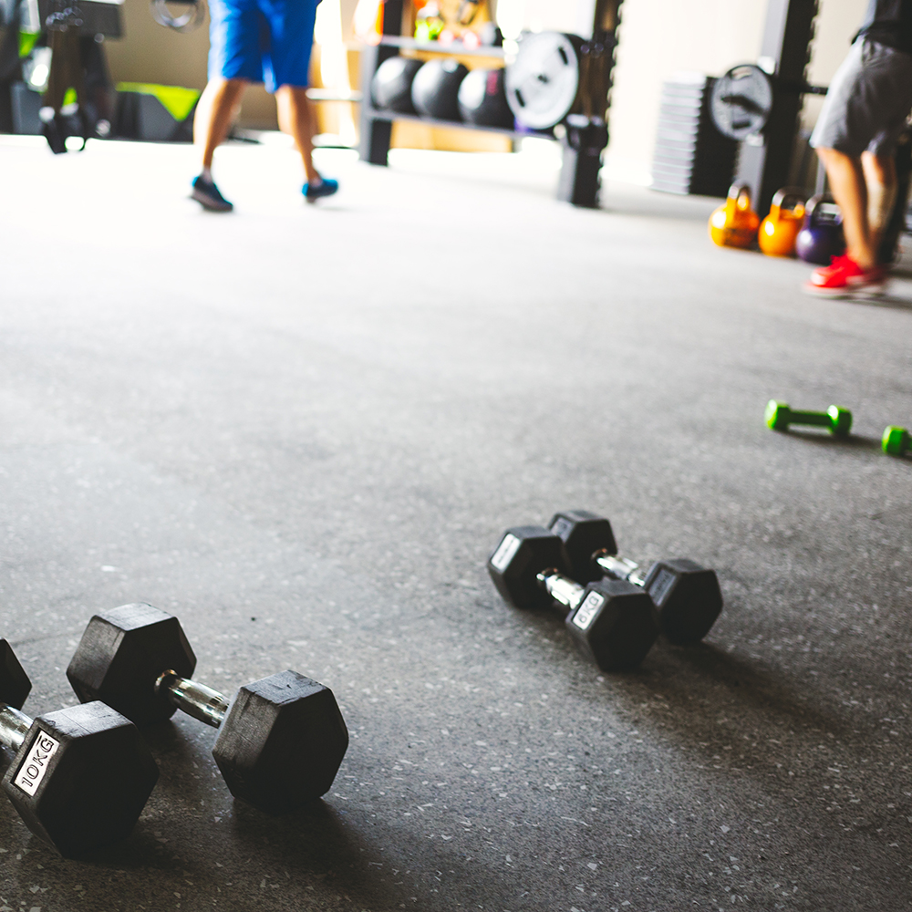 Dumbbells on super black PaviGym Extreme SS Gym Rubber Floor Tiles 22 mm x 39.37x39.37 Inches