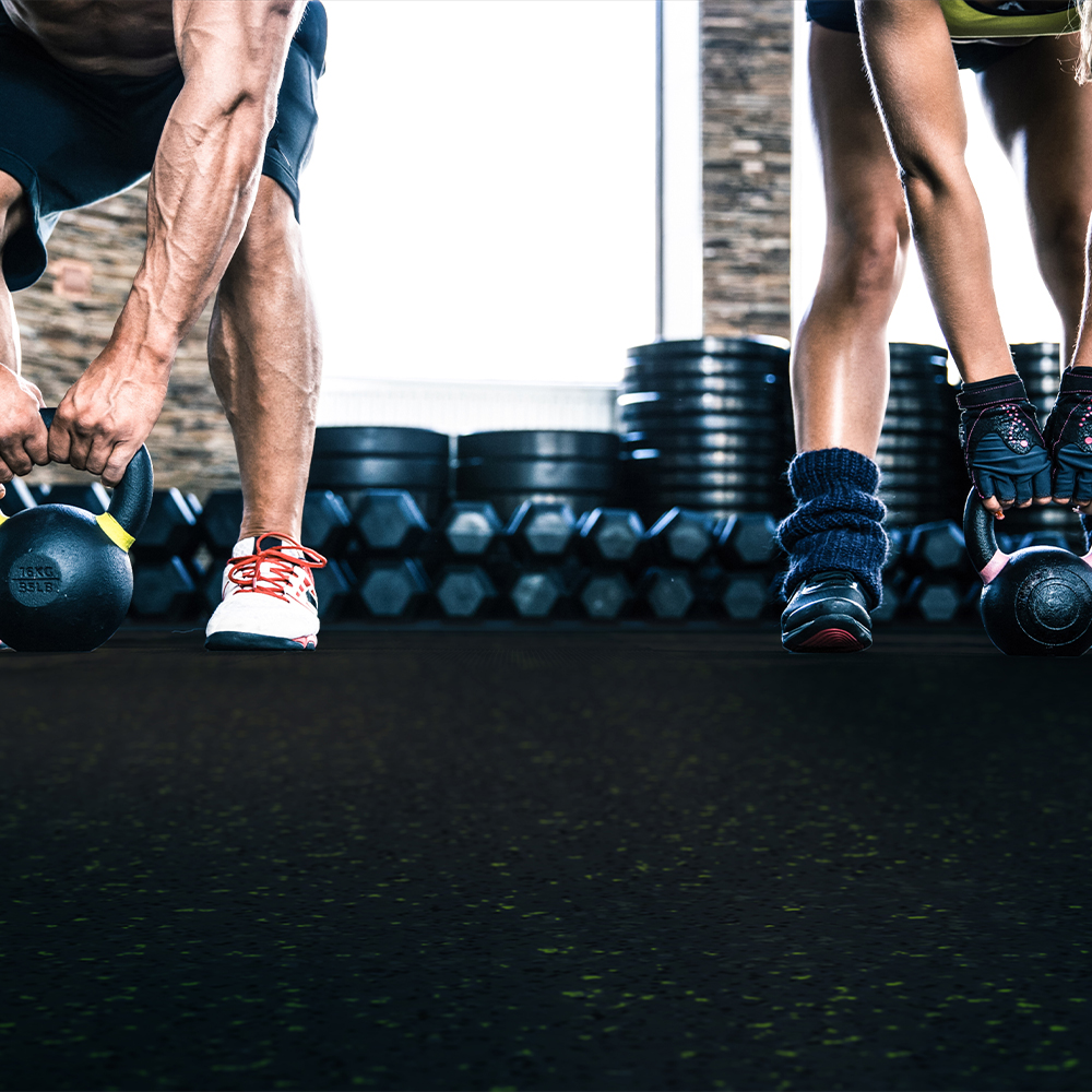 Kettle bell workout on PaviGym Extreme SS Gym Rubber Floor Tiles 22 mm x 39.37x39.37 Inches