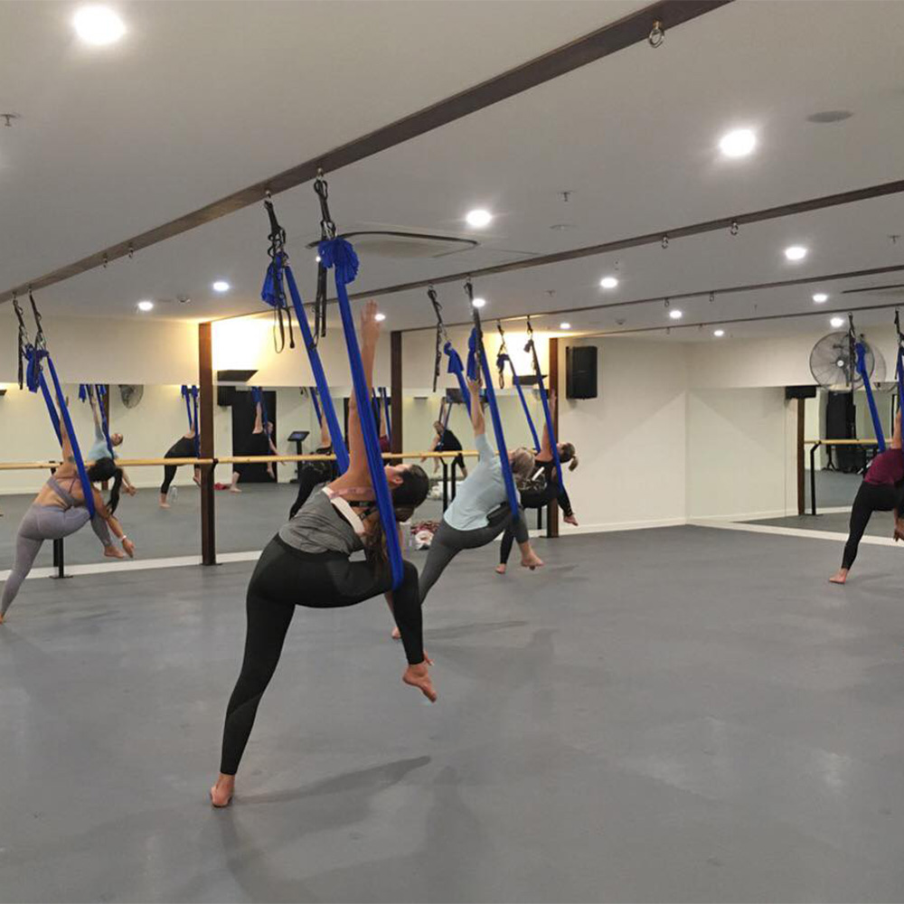 Aerial Arts performed on PaviGym Motion Group Fitness Floor 9 mm x 39.37x39.37 Inches in stone gray