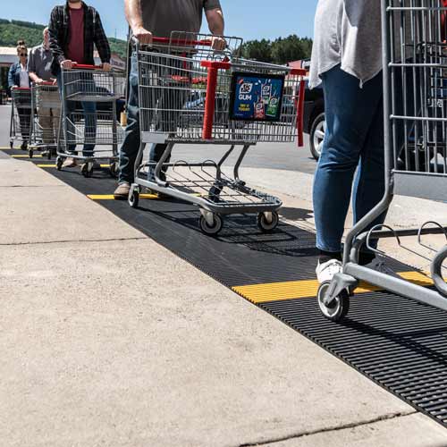 Use Mats with Markings for Social Distancing Customers