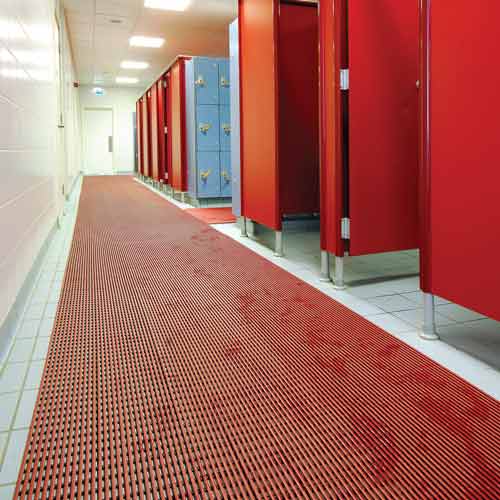 red slip resistant locker room mats with red shower stalls