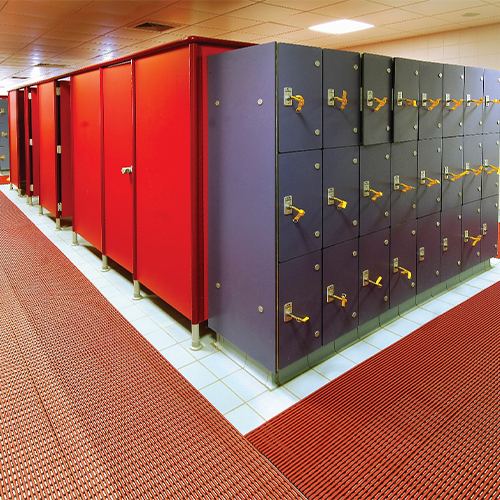 mulberry red Heronrib Wet Area Safety Matting in locker room