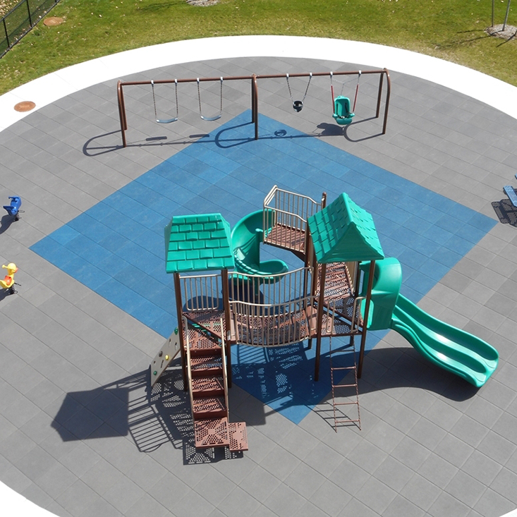 https://www.greatmats.com/images/playground-flooring-bluesky/blue-sky-interlocking-playground-tile-aerial-swing-slide-blue-gray.jpg