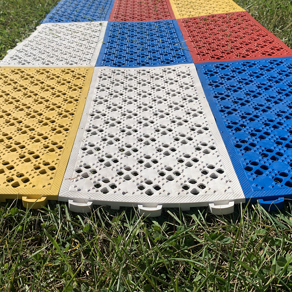 Ergo Matta Perforated Tiles Over Grass