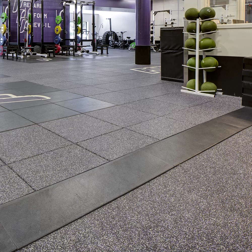 commercial gym with rubber floor tiles