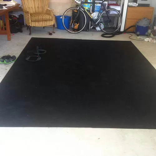 Plyometric Roll 3/8 inch 4x10 ft Black home workout floor.