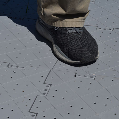 small interlocking tiles to make a turf protection mat