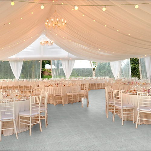 gray portable outdoor event tiles installed under wedding tent