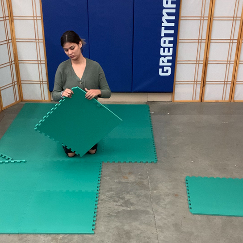 Installing Foam Premium Interlocking Trade Show Mats 10x20 Ft. Kit installing