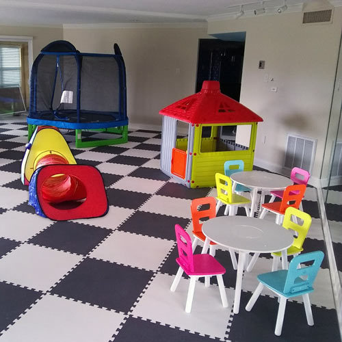 interlocking foam floor mats in basement playroom