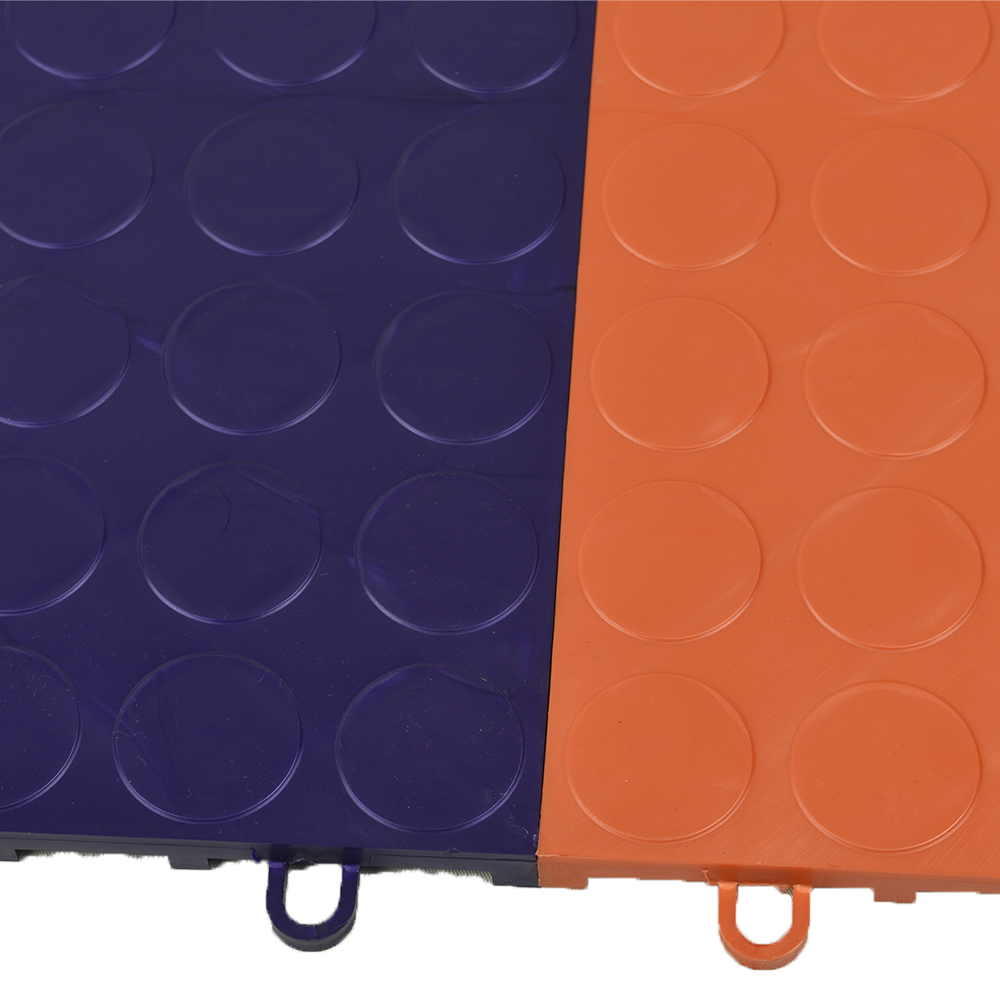 Two tiles interlocked of RaceDeck CircleTrac Garage Floor Tiles 1/2 Inch x 1x1 Ft.