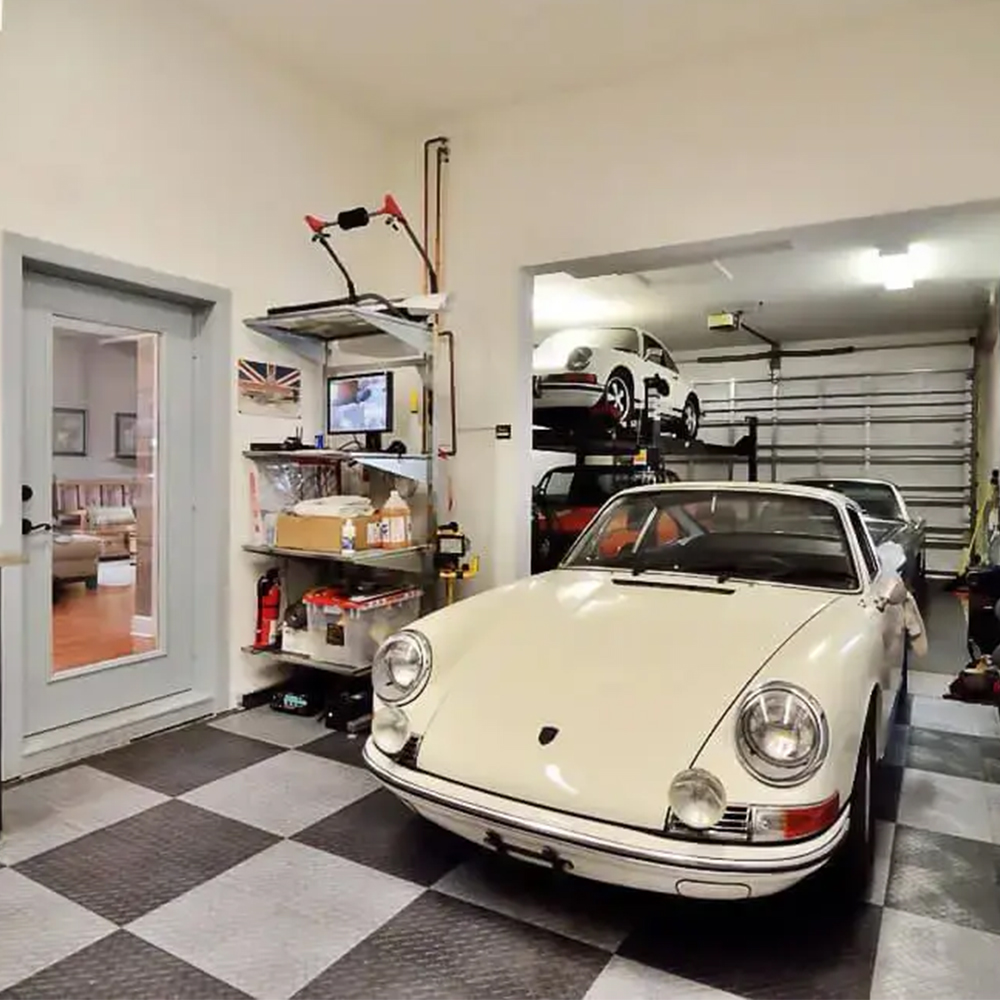 RaceDeck Diamond Garage Floor Tile 1/2 Inch x 1x1 Ft. in alloy and black with porsche parked on