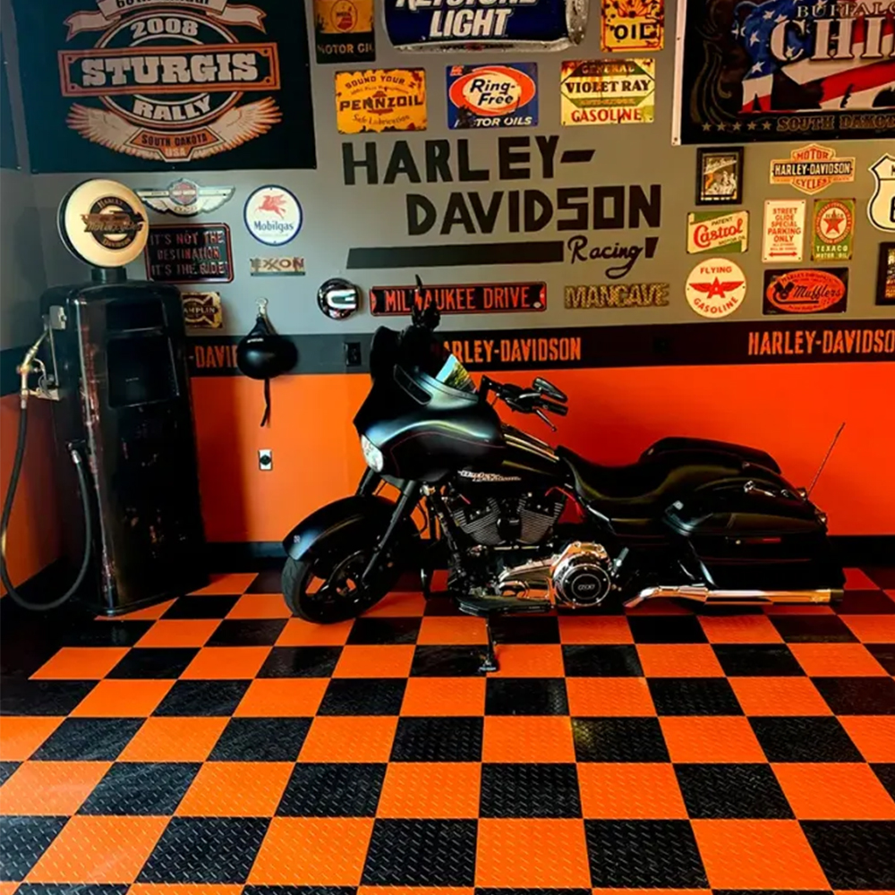 RaceDeck Diamond Garage Floor Tile 1/2 Inch x 1x1 Ft. black and orange tile with motorcycle