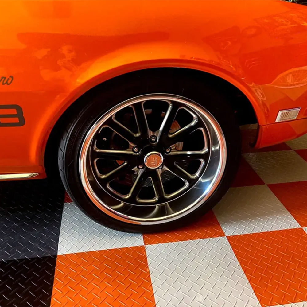 RaceDeck Diamond Garage Floor Tile 1/2 Inch x 1x1 Ft. camaro on Orange, White and Black tiles