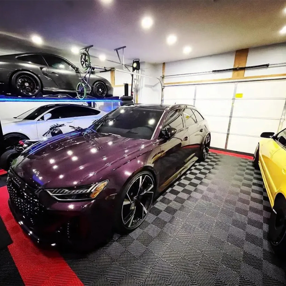 RaceDeck Free-Flow Garage Floor Tile 1/2 Inch x 1x1 Ft. multi car garage with lift tiles in Black and Red