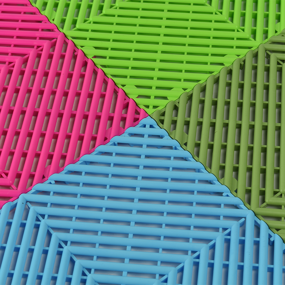 RaceDeck Free-Flow Garage Floor Tile 1/2 Inch x 1x1 Ft. in Neon Pink, Green Light, Sublime and Cool Blue