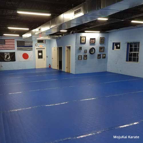 clear tape used on blue martial arts roll out mats