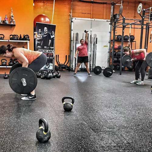 color flecks rubber rolls flooring in WI gym